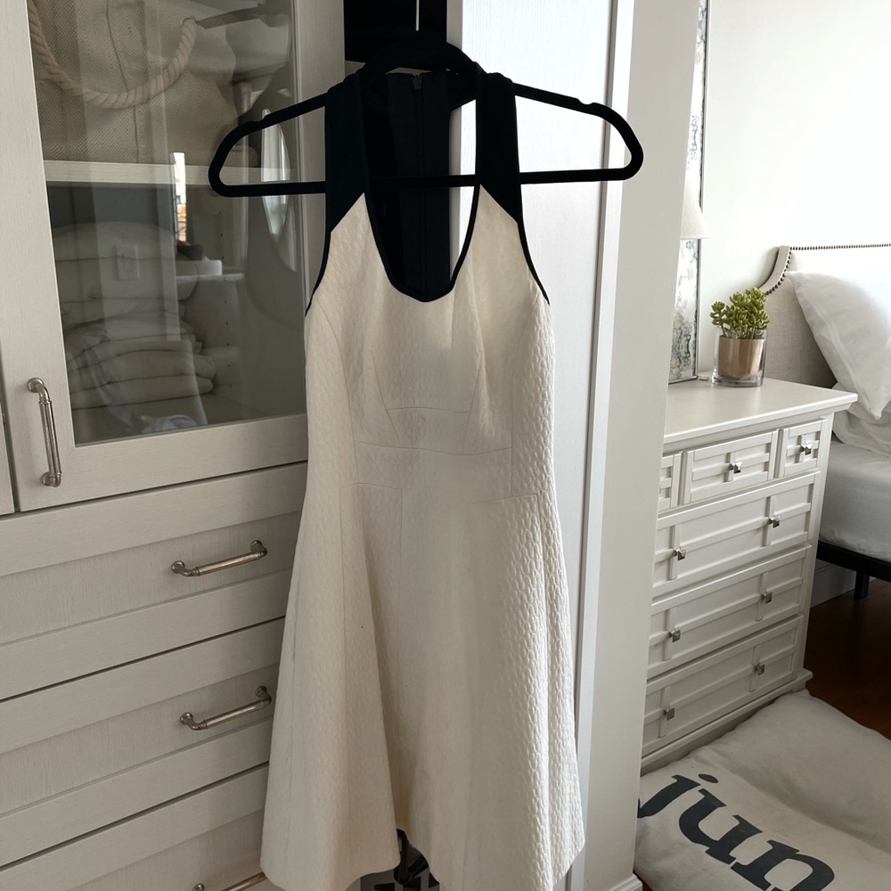 Flattering White racerback dress w black detail